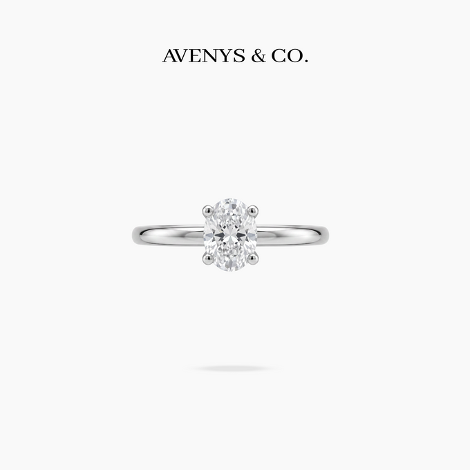 Oval Delicate Ring with White Oval Stone – on White Gold