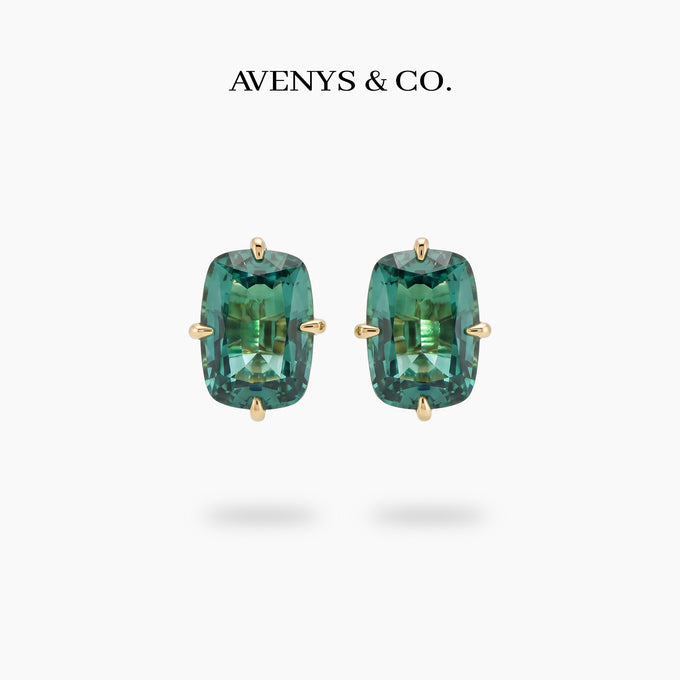 Modern Solitaire Earrings with Blue Oval Stone – on Yellow Gold