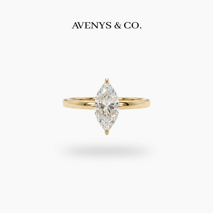 Marquis Solitaire Ring with White Marquise Stone – on Yellow Gold