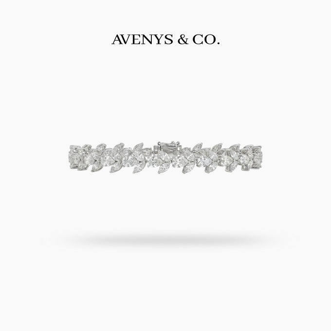 Tennis Bracelet with Pear Cut White Stone