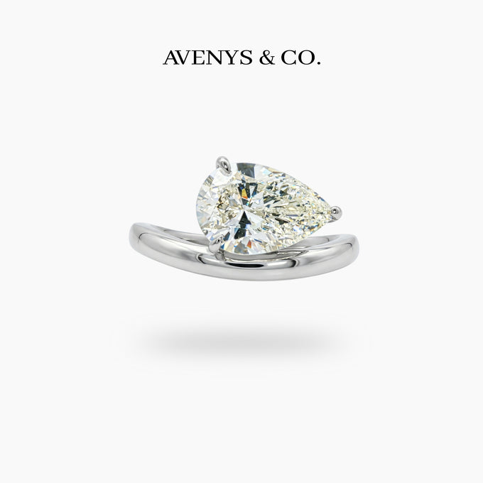 Wave Solitaire Ring with White Pear Stone – on White Gold