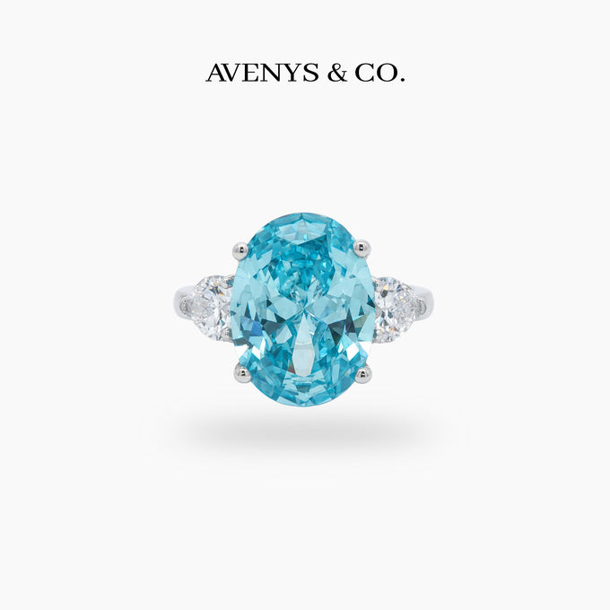 Oval Trilogy Pear Ring with Blue Oval Stone – on White Gold