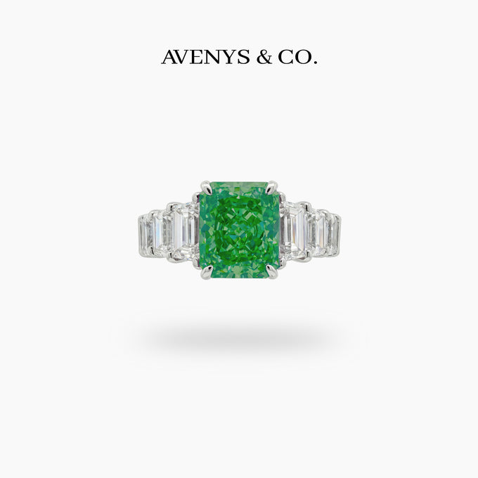 Princess Eternity Ring with Green Radiant Stone – on White Gold