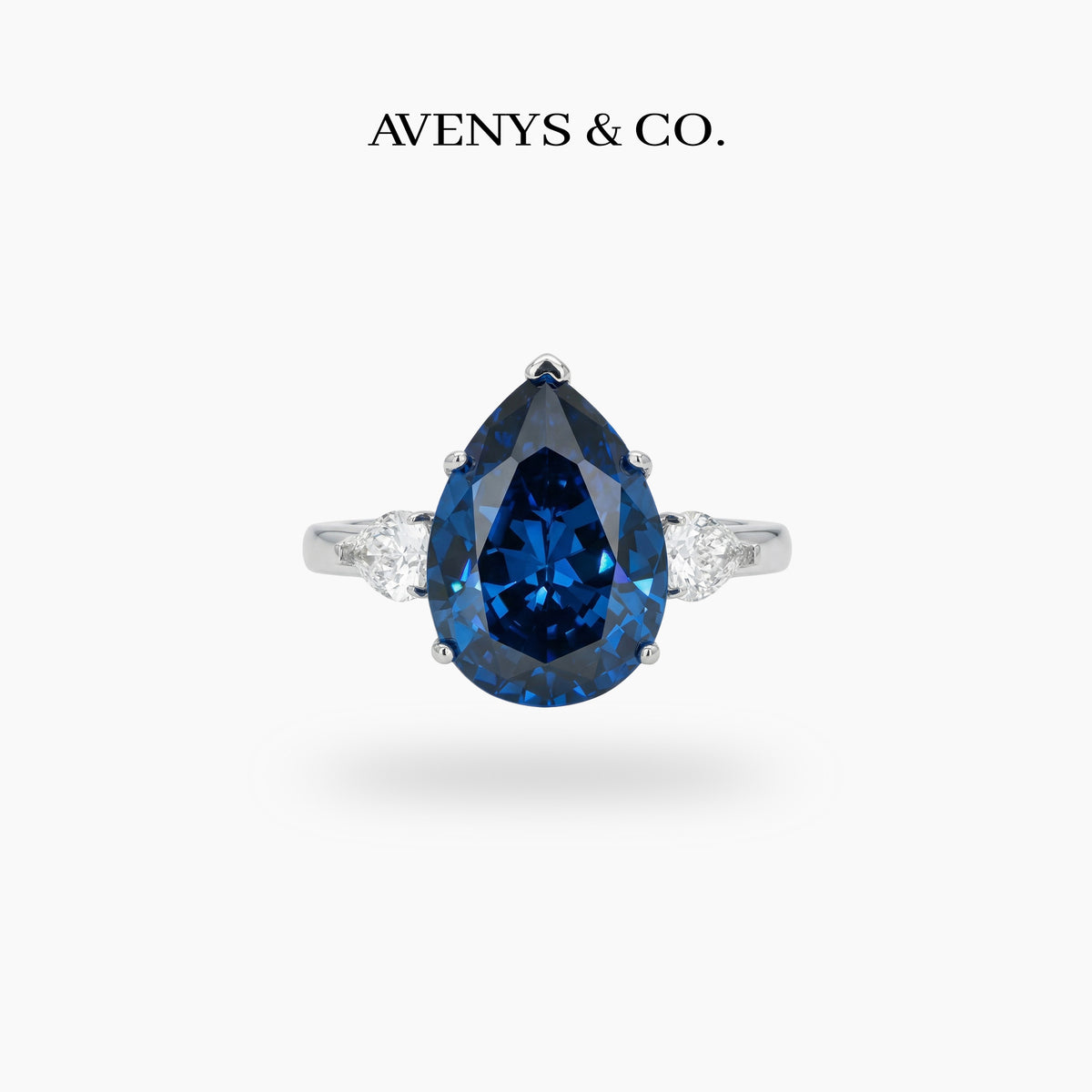 Pear Trilogy Ring with Blue Pear Stone – on White Gold