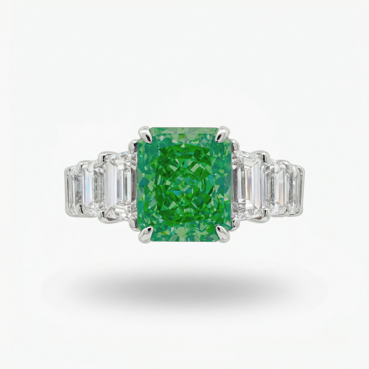 Princess Eternity Ring with Green Radiant Stone – on White Gold