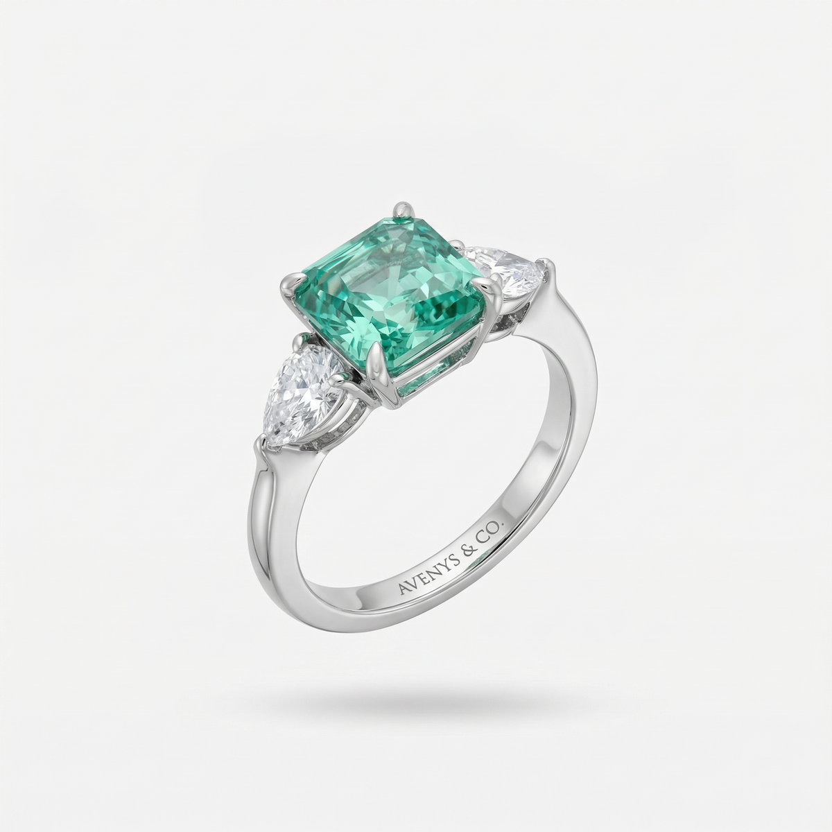 Sea Trilogy Ring with Green Pear Stone – on White Gold