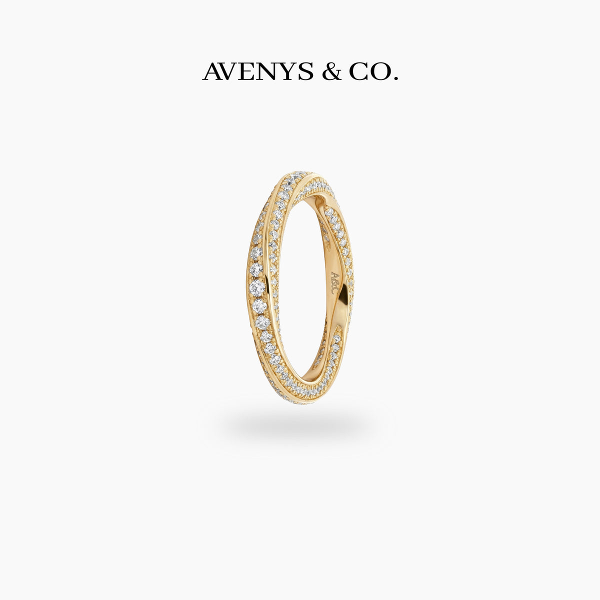 Spiral Ring with White Round Stone – on Yellow Gold