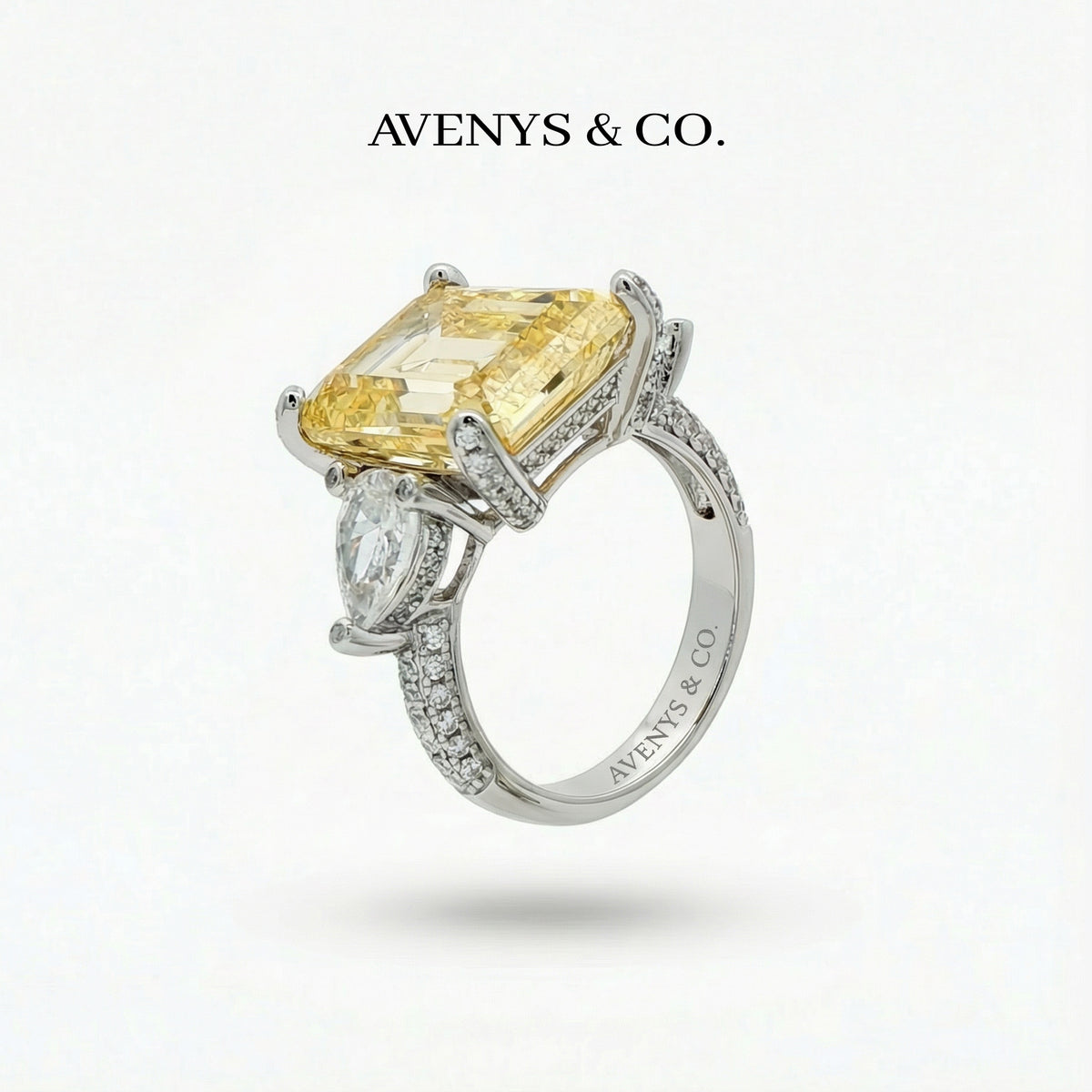 Emerald Pear Trilogy Ring with Yellow Emerald Stone – on White Gold