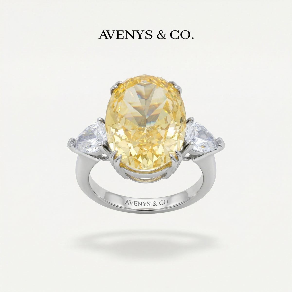 Queens Oval Ring with Yellow Oval Stone – on White Gold