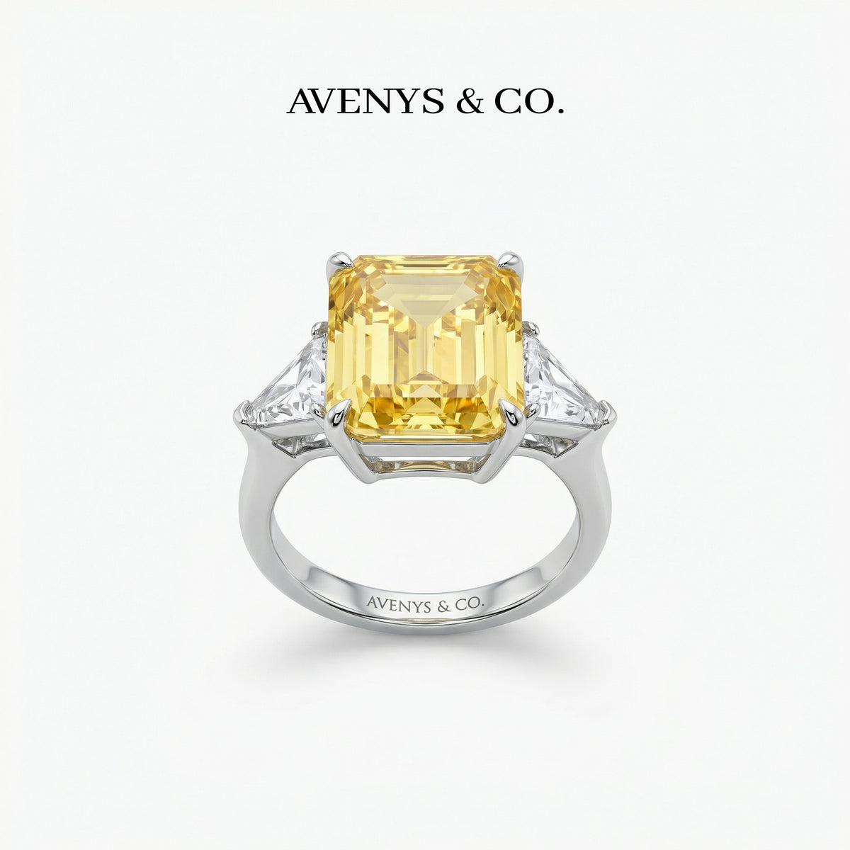 Emerald Trilogy Ring with Yellow Emerald Stone – on White Gold