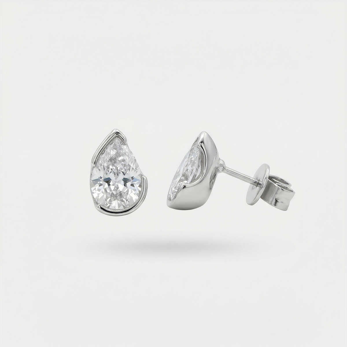 Duality Earrings with White Pear Stone – on White Gold