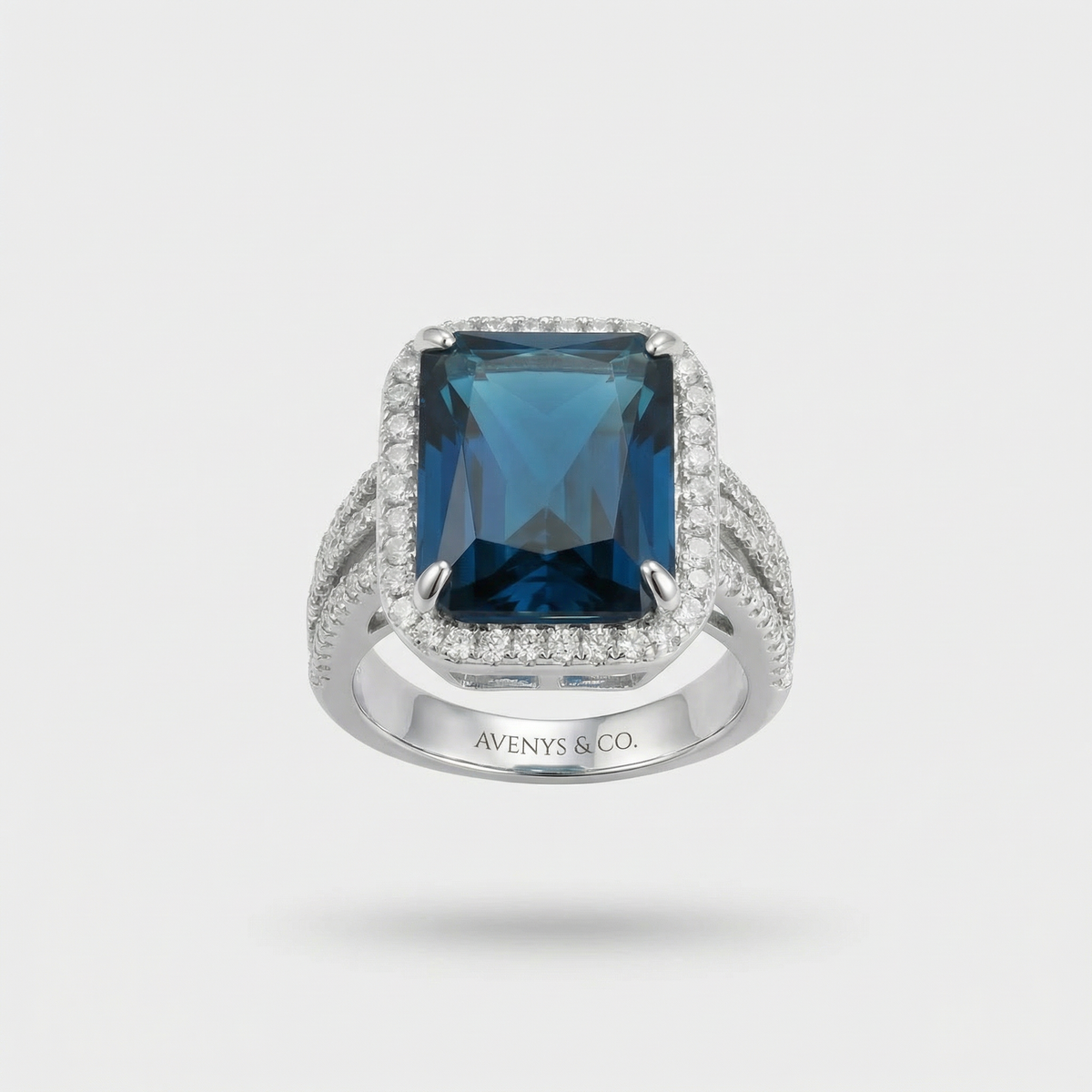 Triple Shank Radiant Ring with Blue Radiant Stone – on White Gold