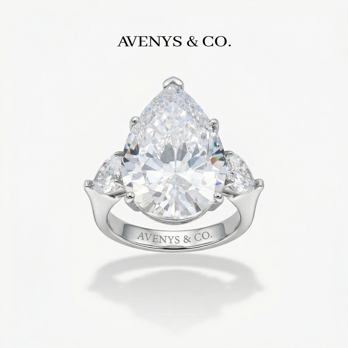 Pear Trilogy Ring with White Pear Stone – on White Gold