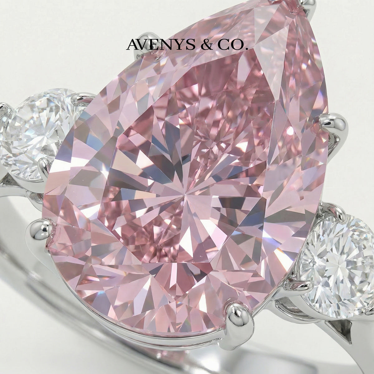Pear Trilogy Ring with Pink Pear Stone – on White Gold