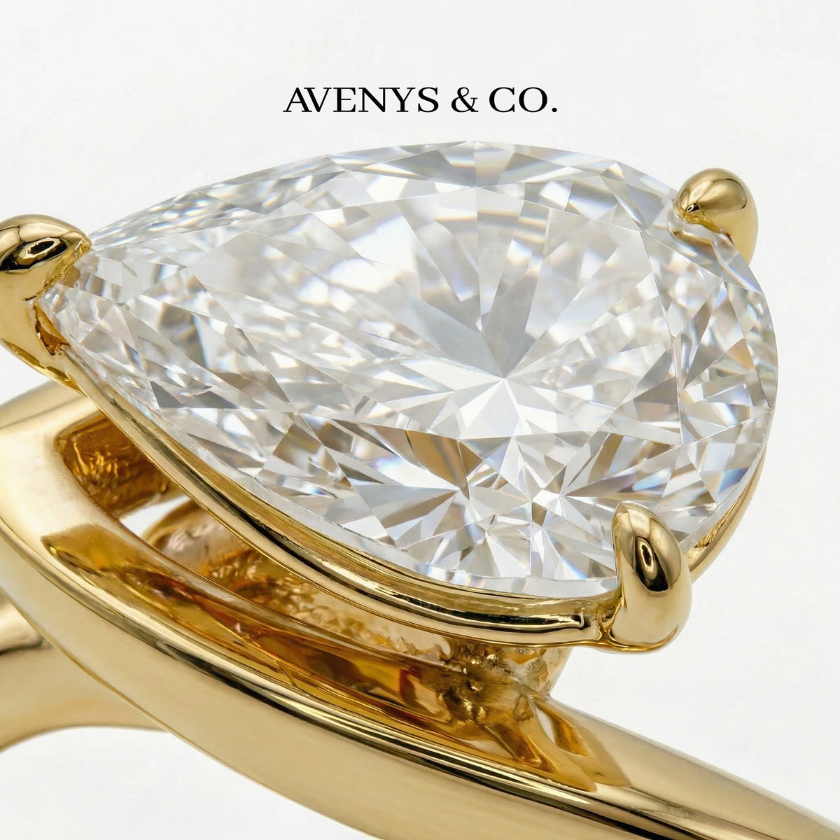 Aerial Pear Ring with White Pear Stone – on Yellow Gold