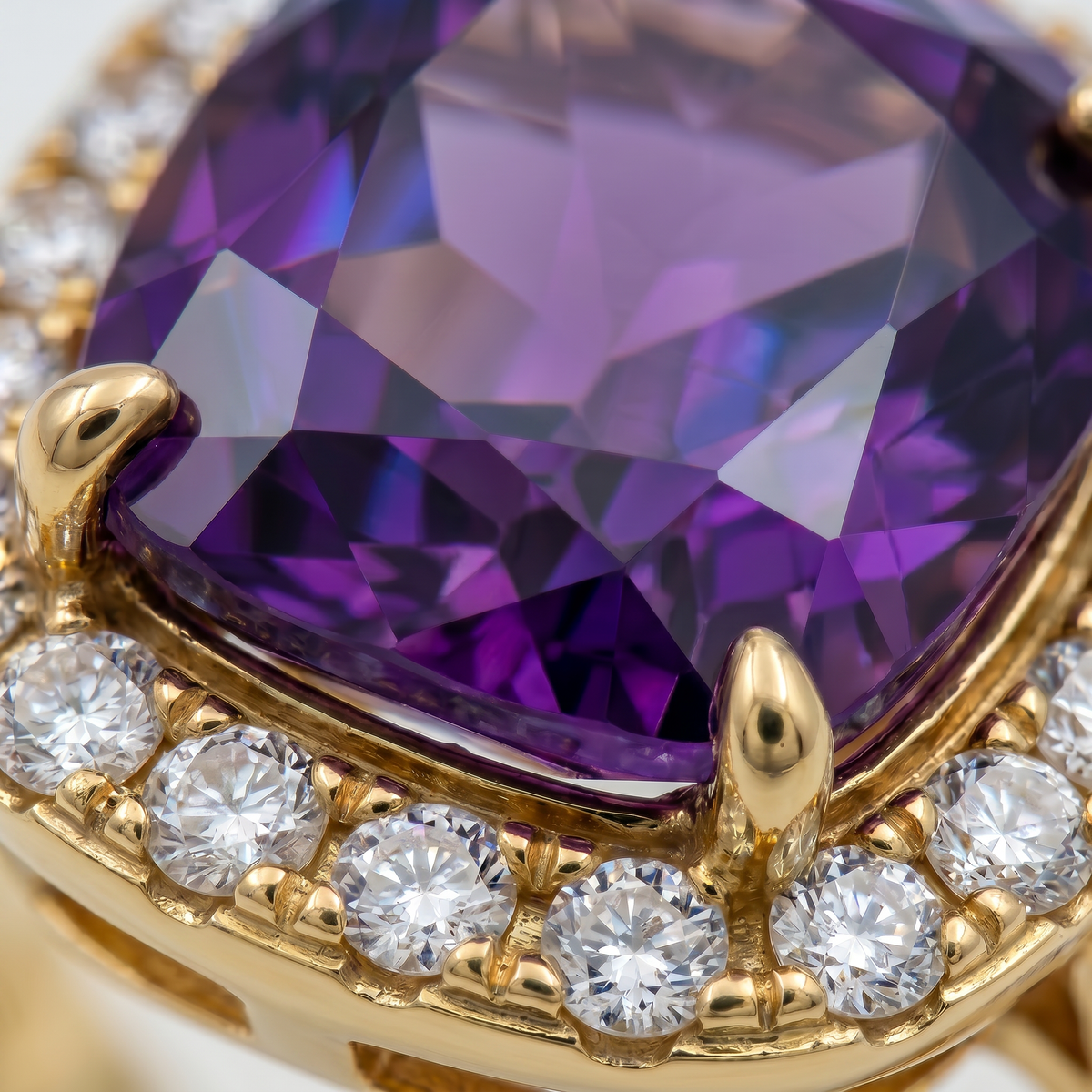 Amethyst Halo Ring with Purple Cushion Stone – on Yellow Gold