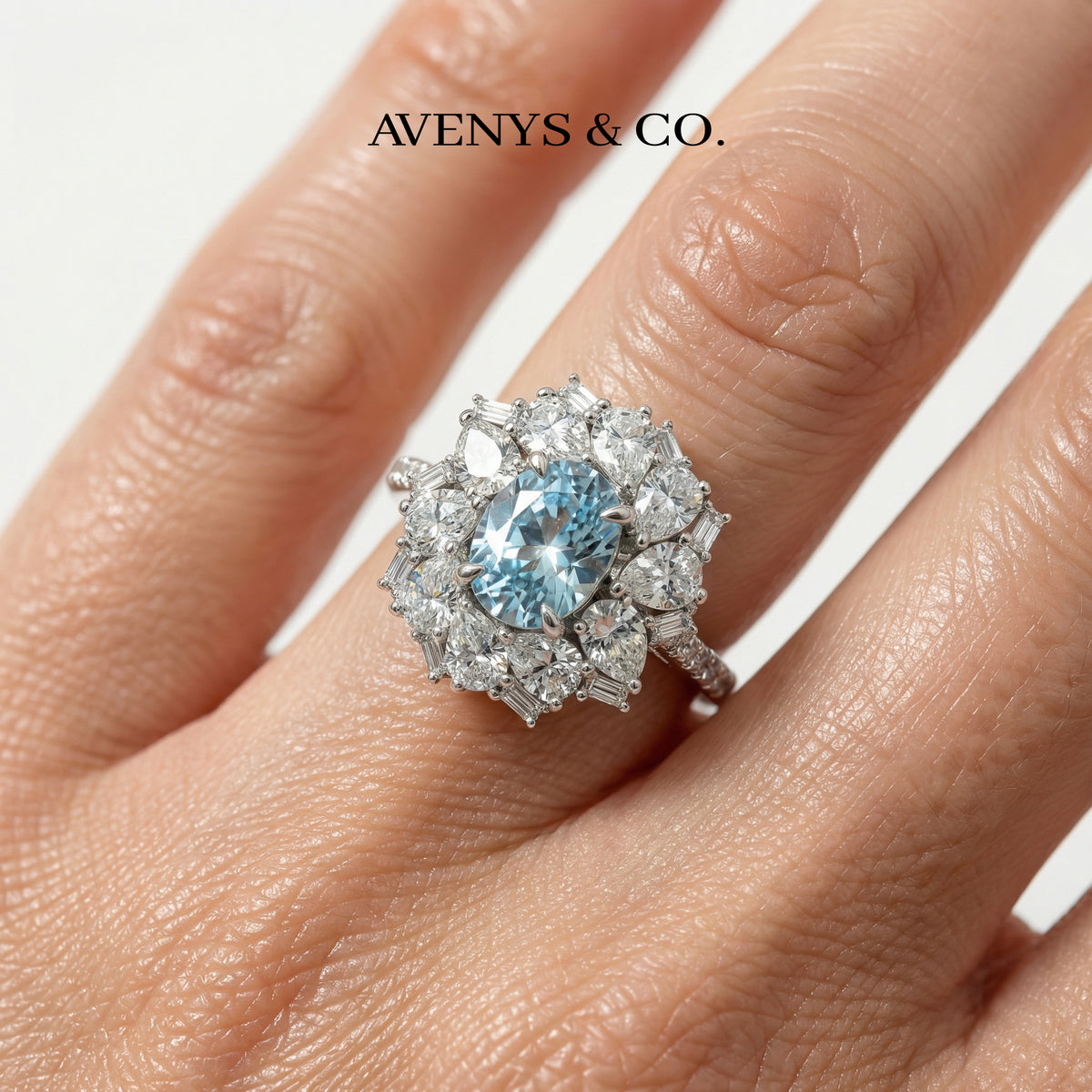 Bloom Halo Ring with Blue Oval Stone – on White Gold