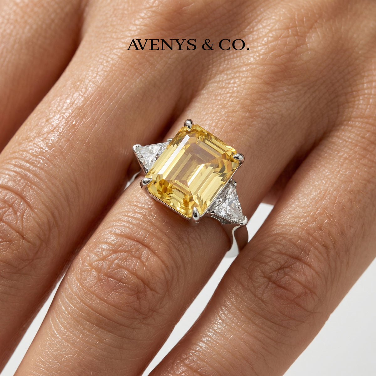 Emerald Trilogy Ring with Yellow Emerald Stone – on White Gold
