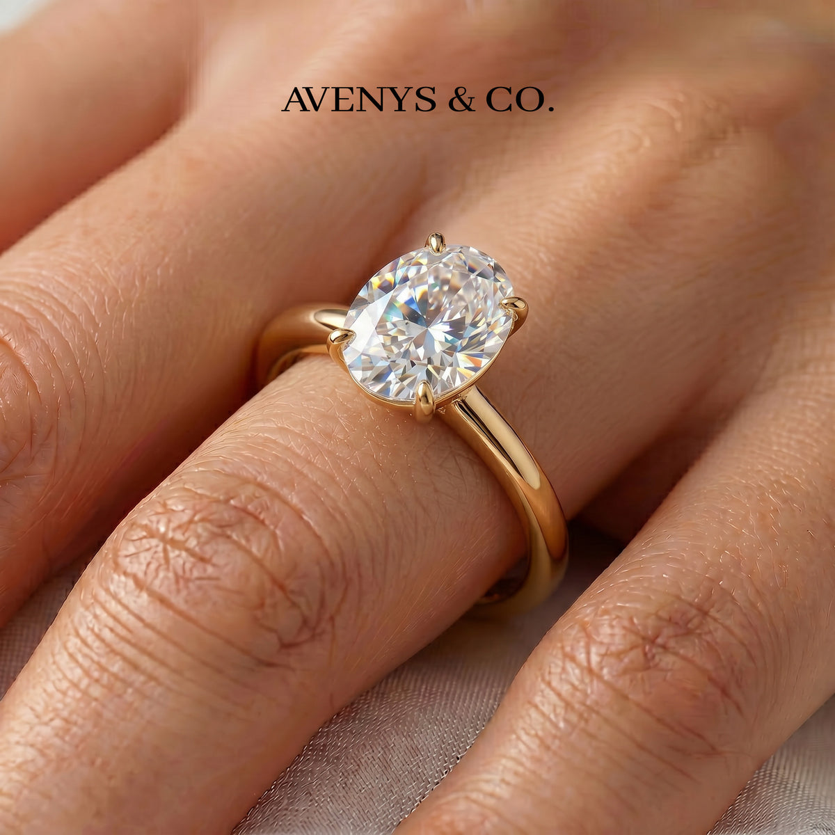 Oval Solitaire Ring with White Oval Stone – on Yellow Gold