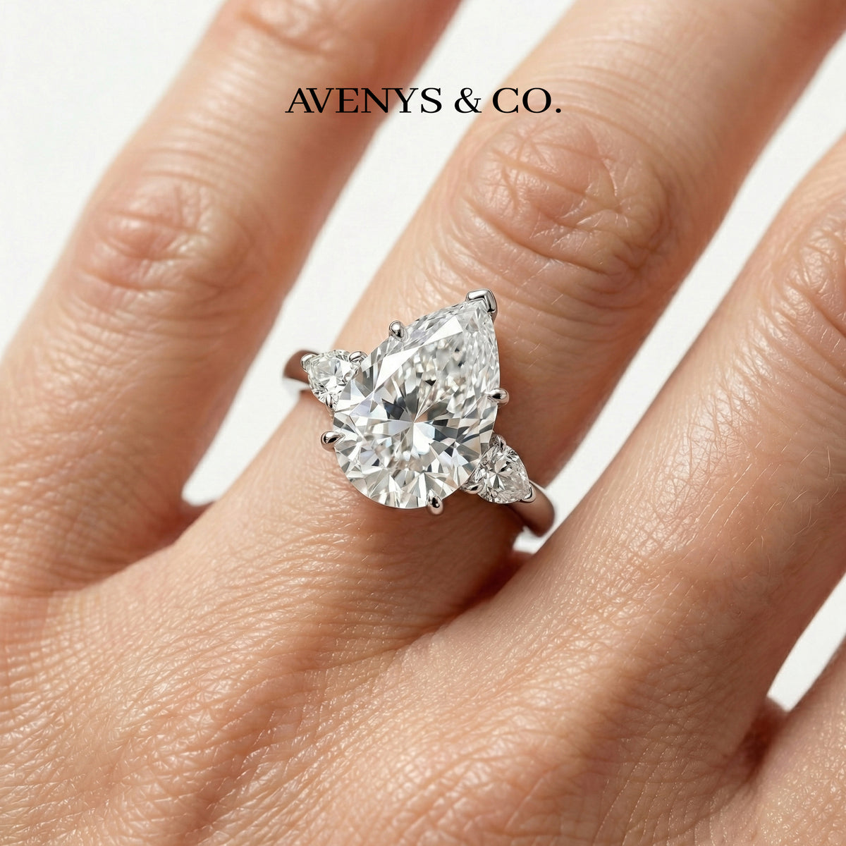 Pear Trilogy Ring with White Pear Stone – on White Gold