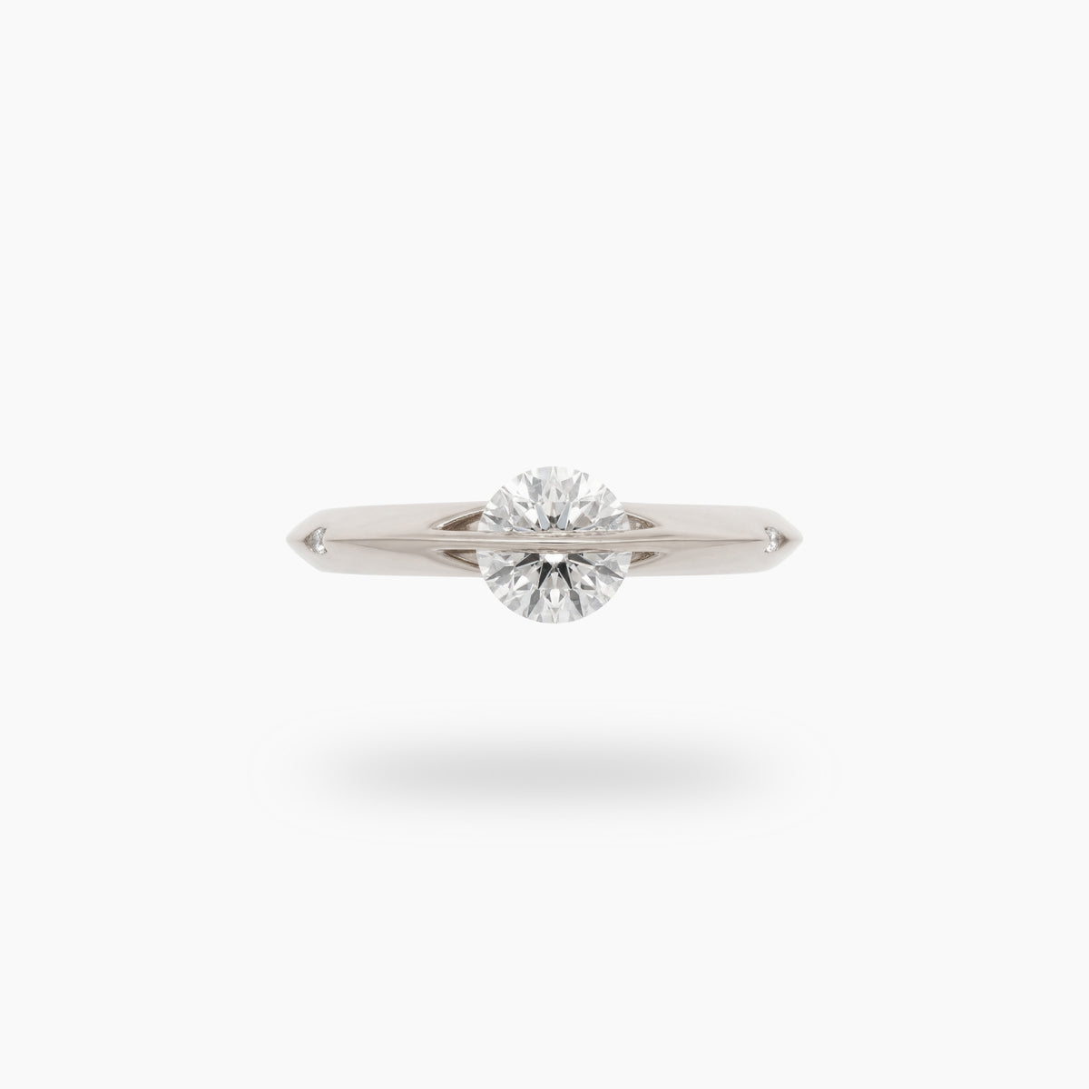 Dancing Diamonds Slim Ring with White Round Stone – on White Gold