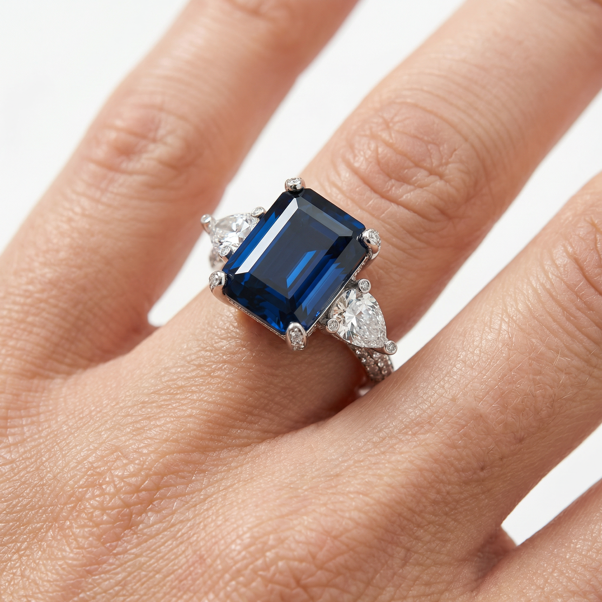 Emerald Pear Trilogy Ring with Blue Emerald Stone – on White Gold