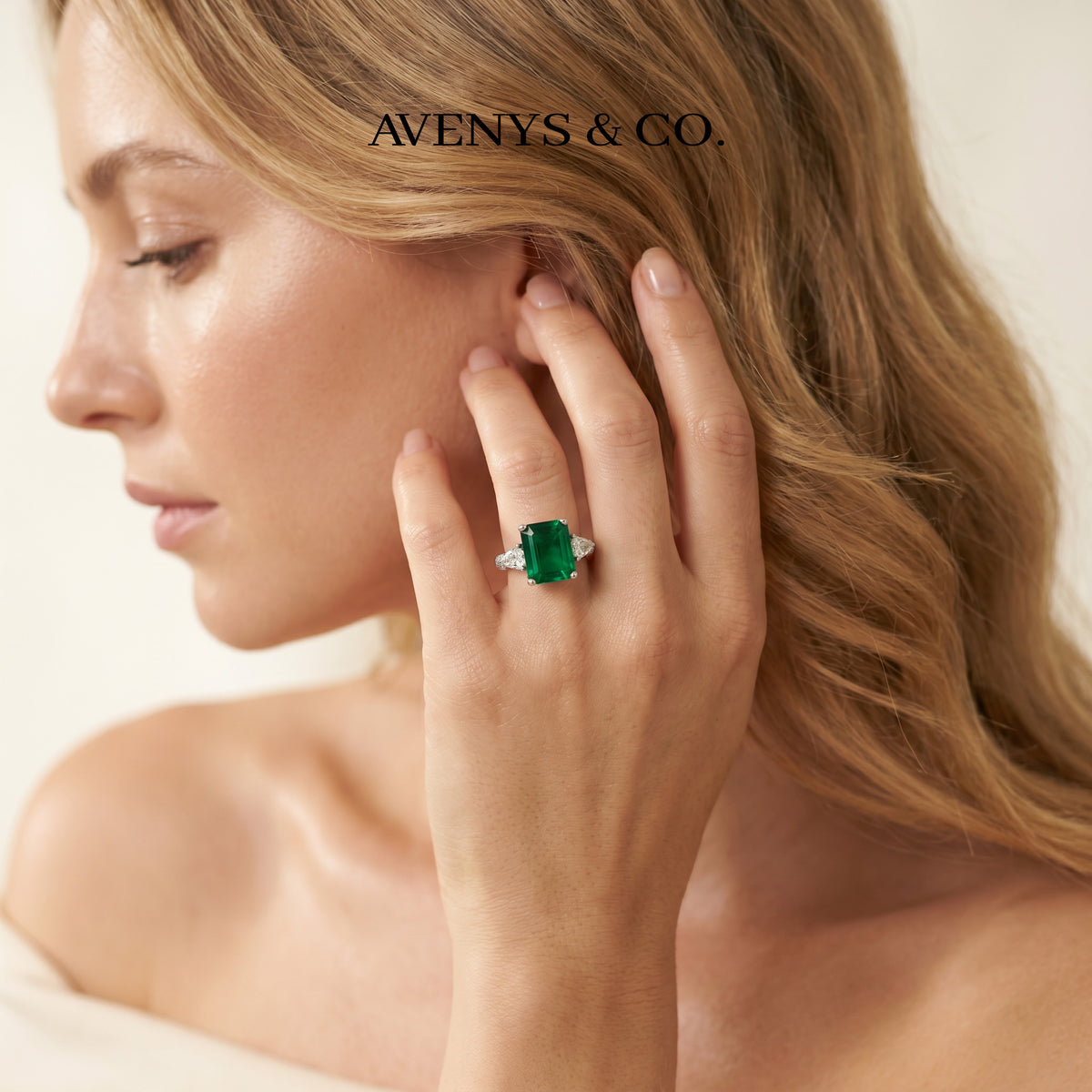 Emerald Pear Trilogy Ring with Green Emerald Stone – on White Gold