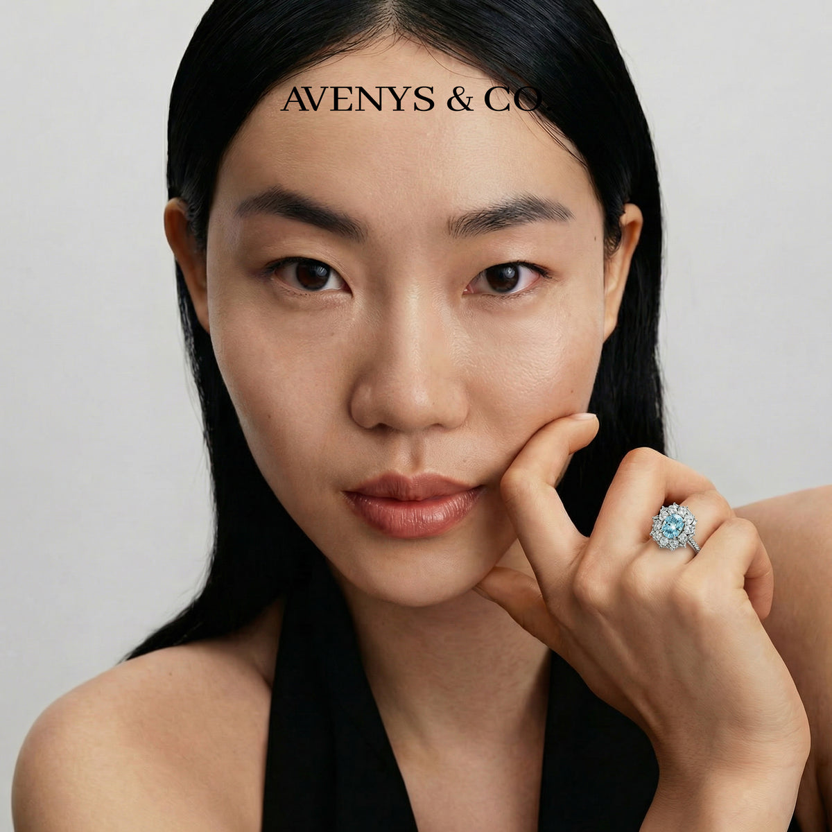 Bloom Halo Ring with Blue Oval Stone – on White Gold