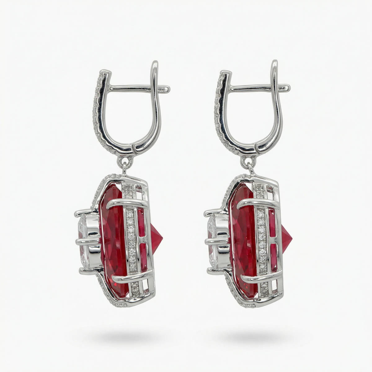 Embrace Queens Earrings with Red Oval Stone – on White Gold