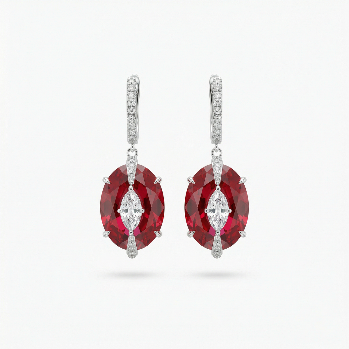 Embrace Queens Earrings with Red Oval Stone – on White Gold
