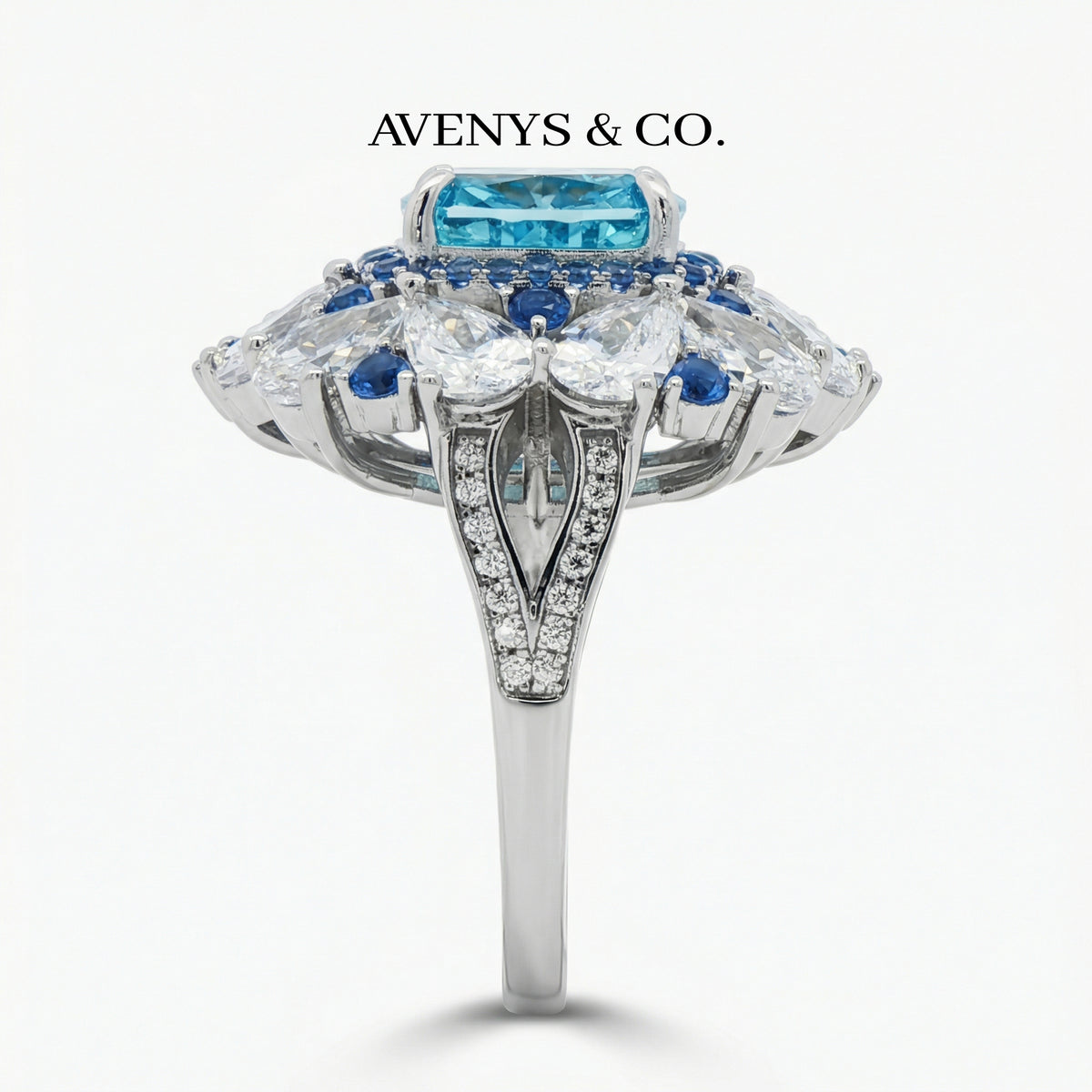 Royal Flower Halo Ring with Blue Cushion Stone – on White Gold