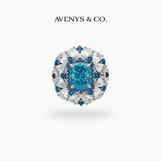 Royal Flower Halo Ring with Blue Cushion Stone – on White Gold