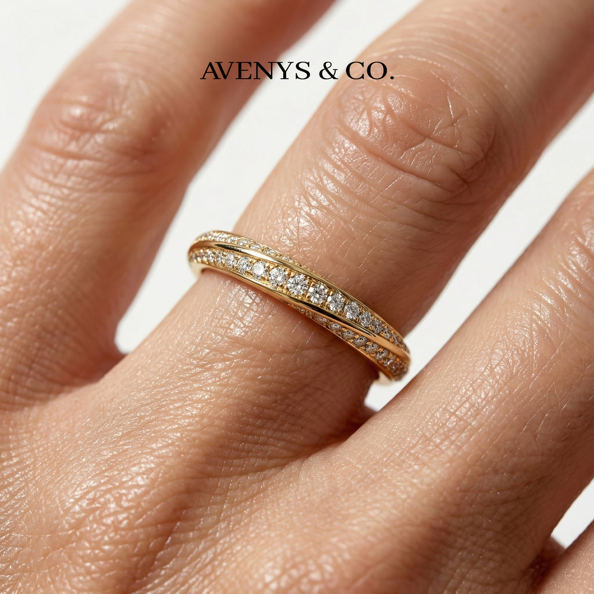 Spiral Ring with White Round Stone – on Yellow Gold