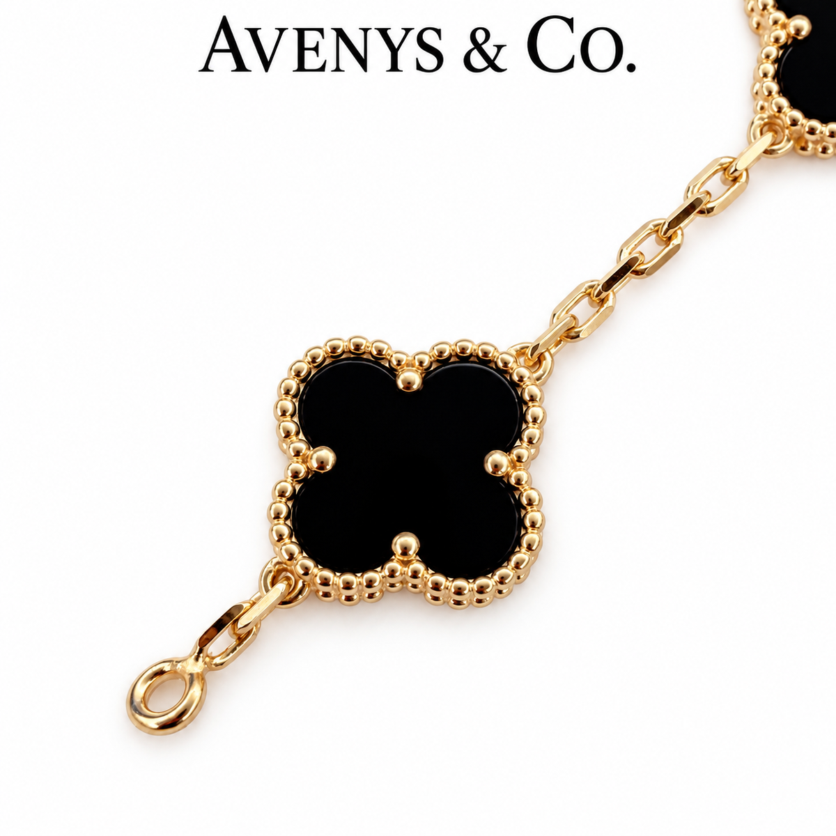 Black end motif, terminal ring and faceted chain detail