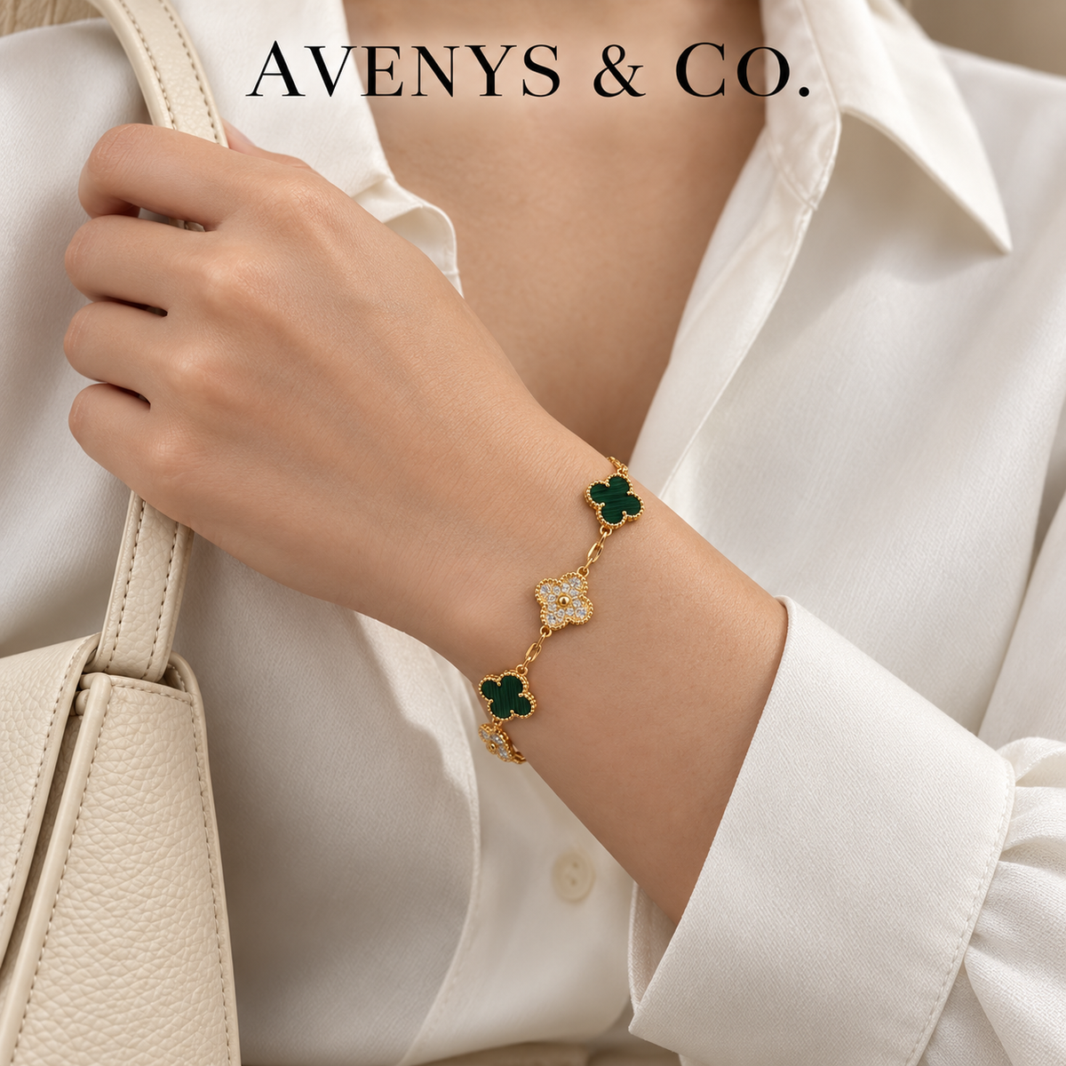 Green malachite bracelet styled with an ivory blouse
