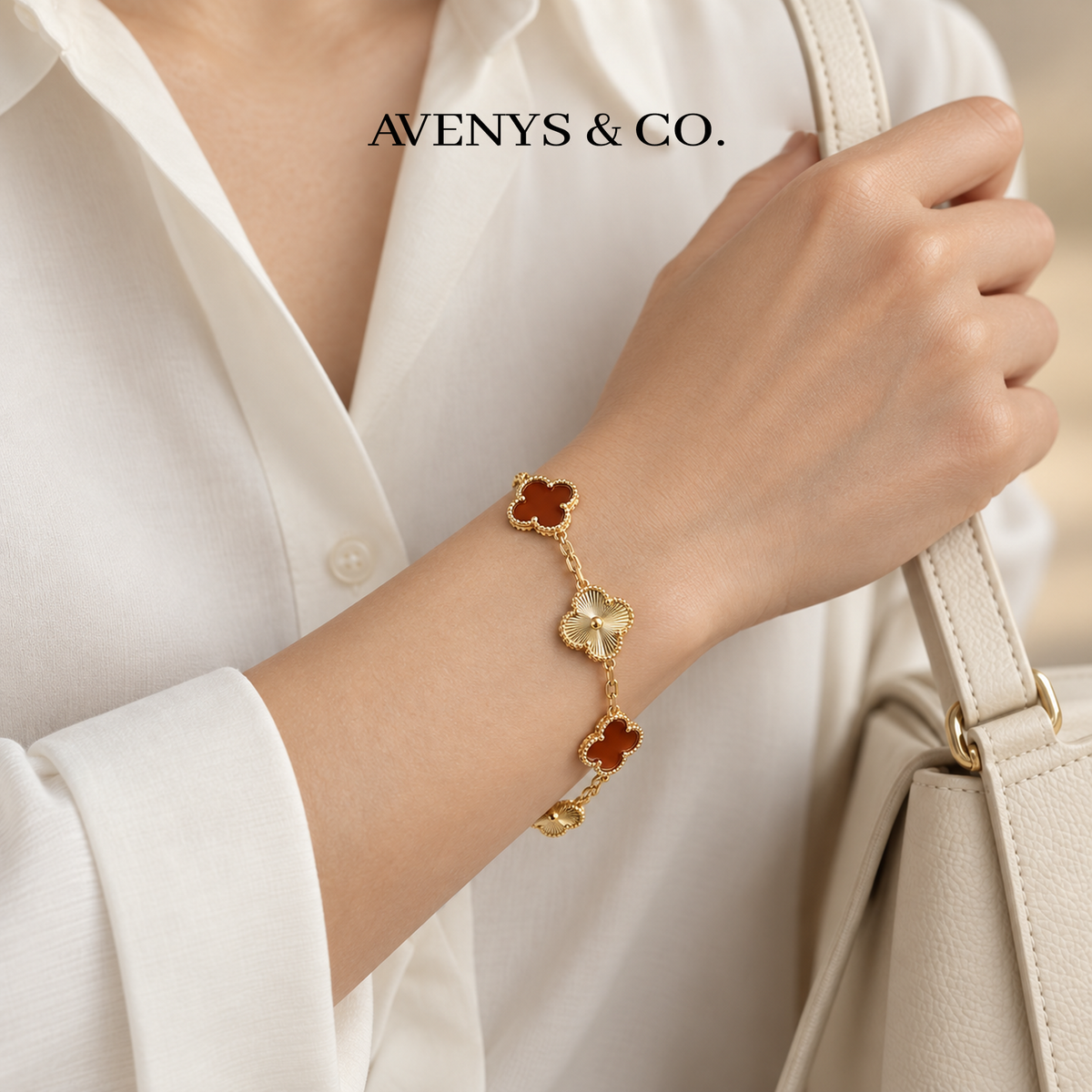 Red and Gold Sunburst bracelet styled with an ivory blouse