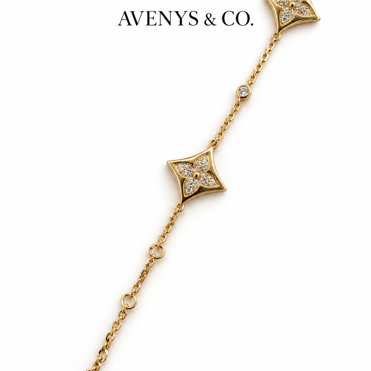 AV Bloom Starburst Bracelet on Yellow Gold — chain and adjustment detail