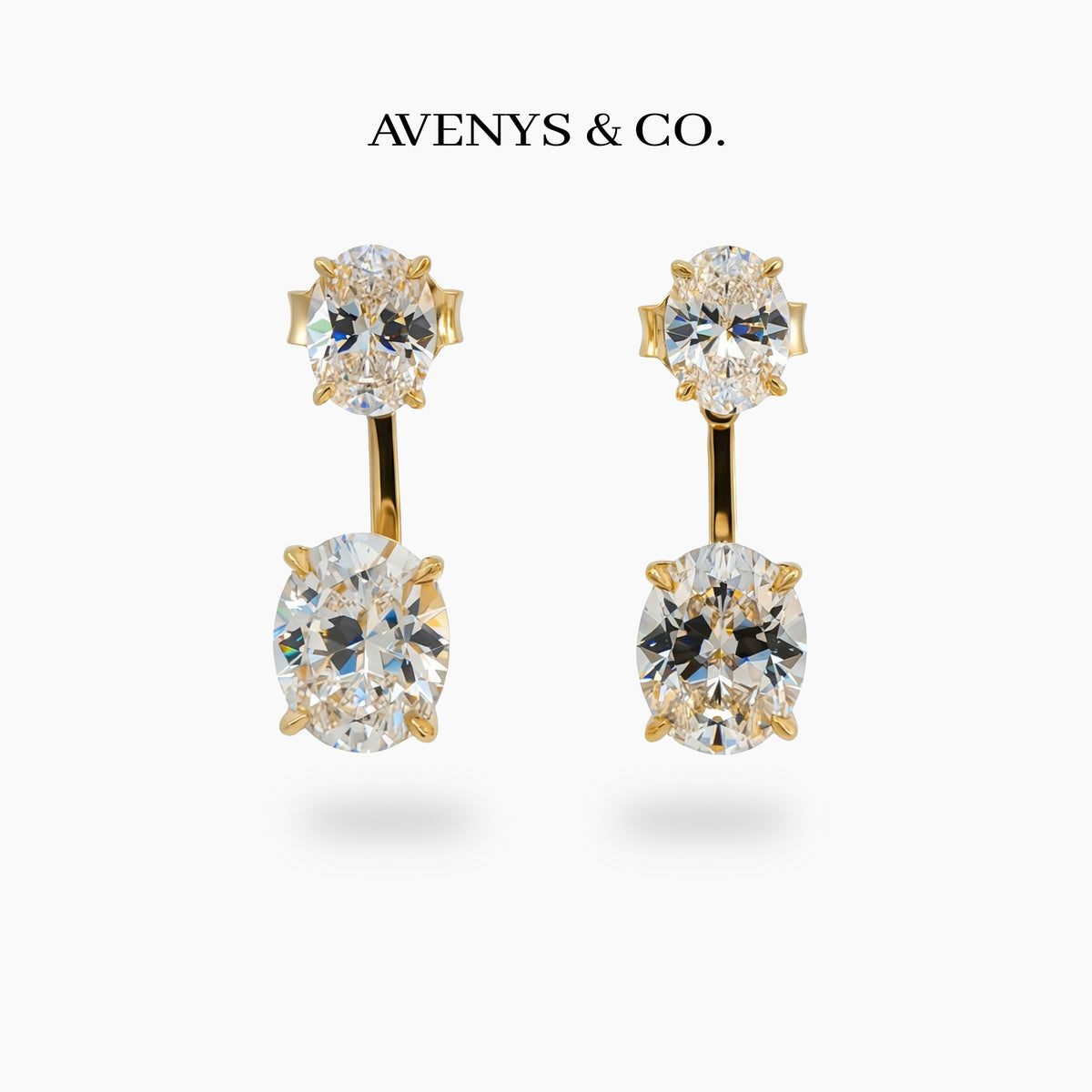 Air Drop Earrings with White Oval Stone – on Yellow Gold